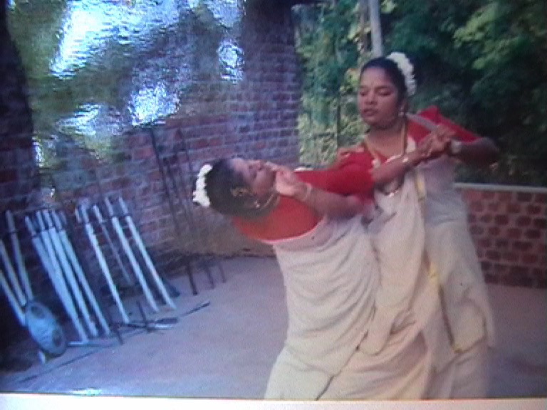 women fighting kalari